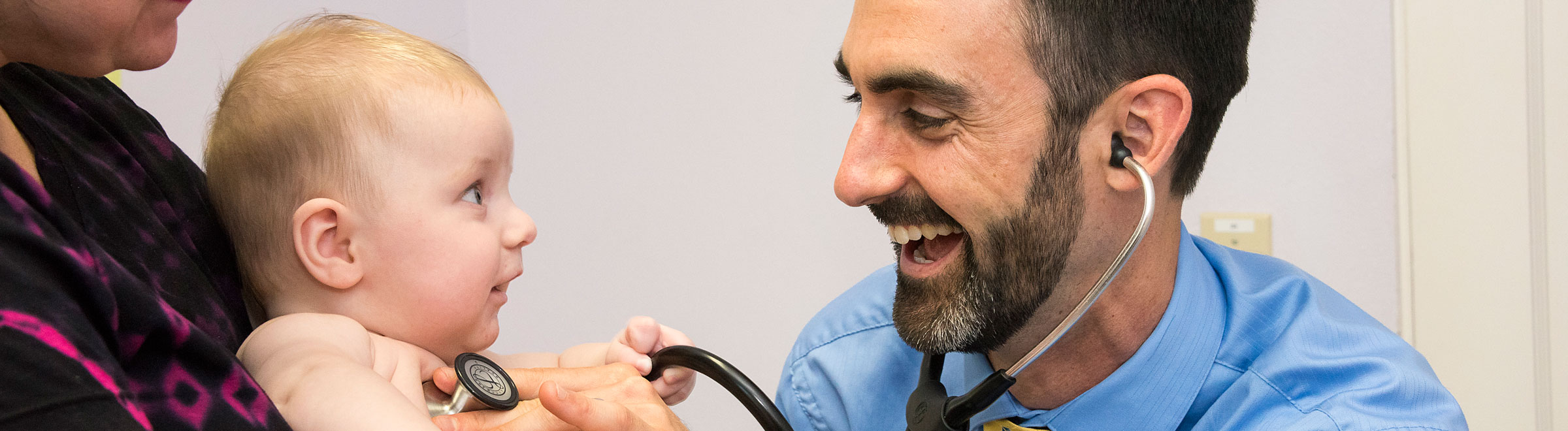 Pediatric doctor treating baby in Portland, OR